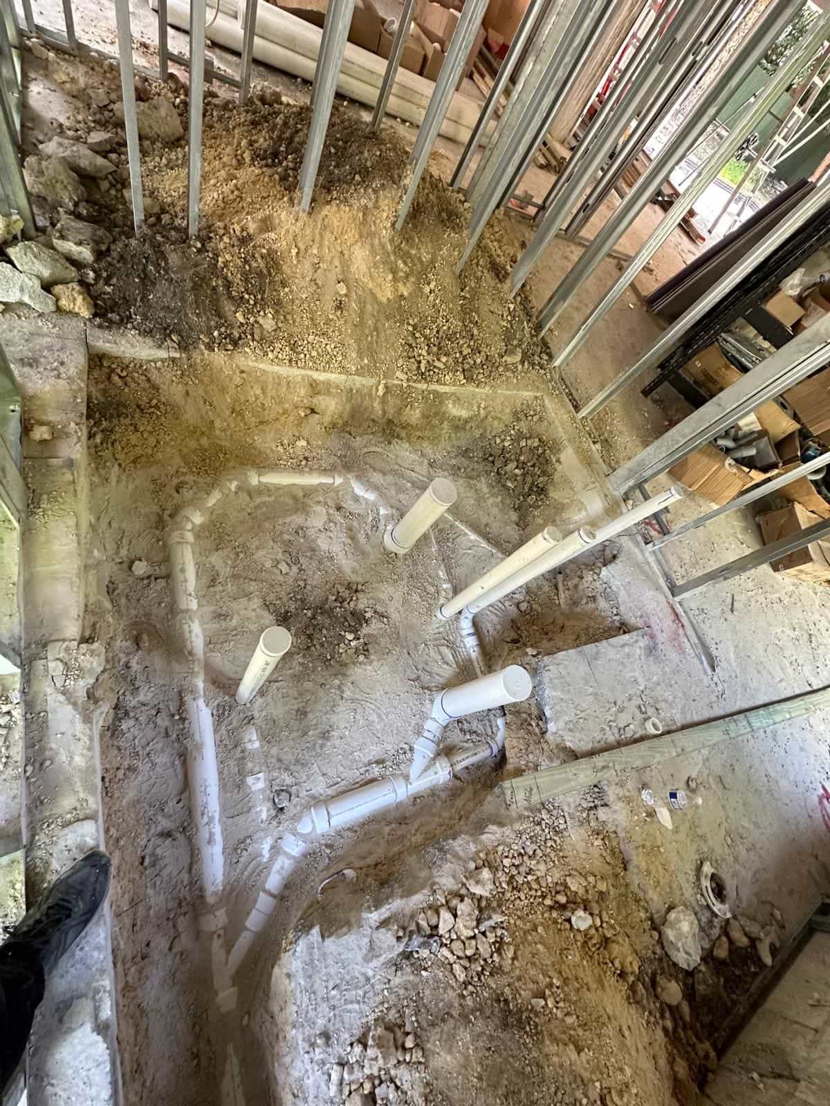 Before and after of a Underground pipe assemply by a plumber in Doral